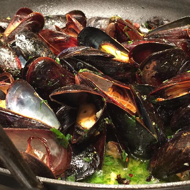 Roasted mussels. Chopped Italian parsley, garlic, extra virgin olive