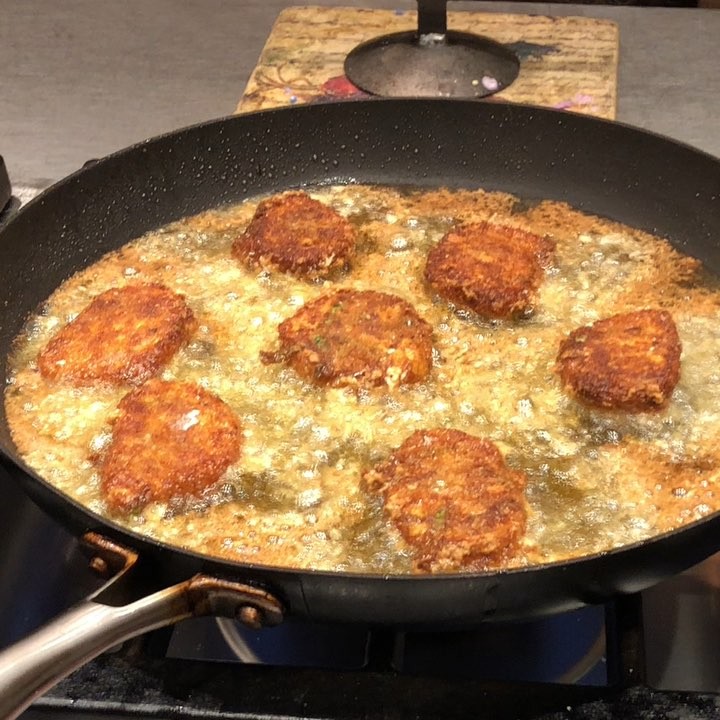 Breaded and fried fresh mozzarella cheese and basil