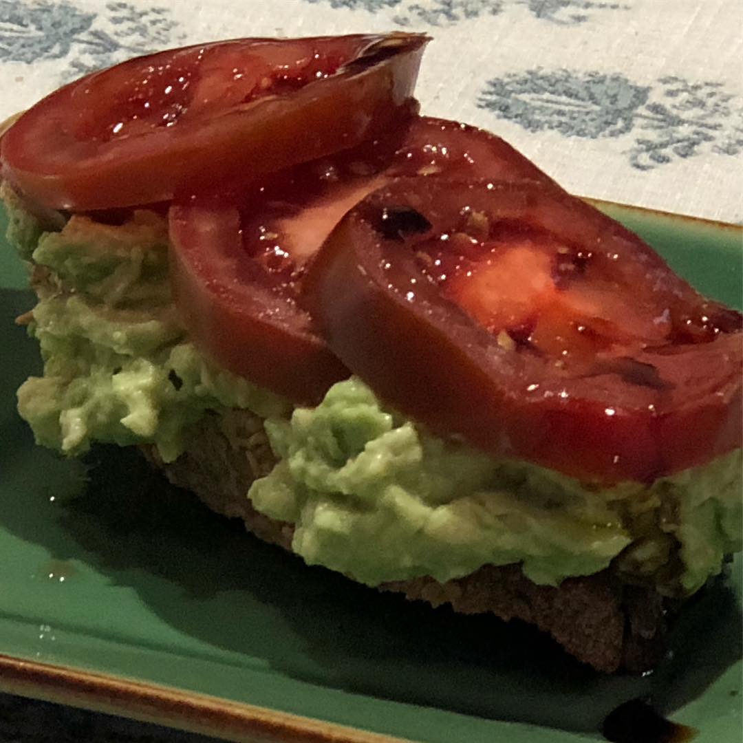 Christmas colors taste so good!! Avocado toast with Kumato tomatoes and drizzled with balsamic glaze